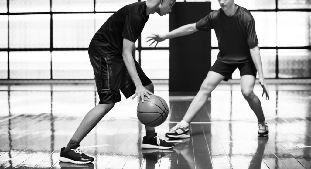 Isolation move basketball drill between two boys